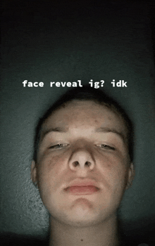 a close up of a person 's face with the words face reveal ig idk written above it