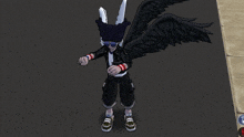 a cartoon character with white wings is standing on a sidewalk