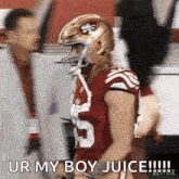 a football player is wearing a helmet and saying ur my boy juice !!!