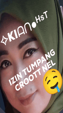 a woman wearing a green hijab with the words kian hst on top