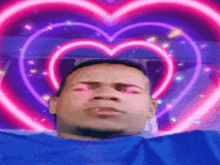 a man 's face is surrounded by a heart shaped light