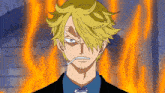 a man with a cigarette in his mouth is standing in front of flames
