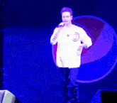 a man is dancing in front of a pepsi sign
