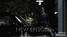a man standing next to a car with the words " new episode " on it