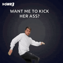 a man in a white shirt is dancing with the words want me to kick her ass