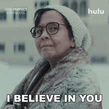 an advertisement for nine perfect strangers shows a woman wearing glasses and a fur coat