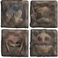 a set of four images of a cat , a bird , a skull , and a rabbit .