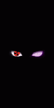 a pair of purple eyes on a black background