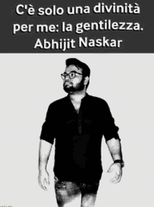 a black and white photo of a man with a beard and glasses