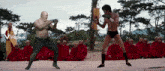 a boxing match between two bald men with a viggle.ai logo on the bottom right