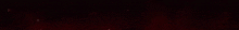 a close up of a red background with a few white lines on it .