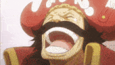 a man with a mustache and a red hat is laughing