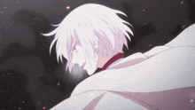 a close up of a person with white hair and red eyes