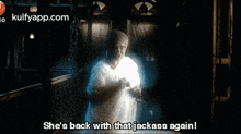 a ghost is appearing in a dark hallway and says she 's back with that jackass again .