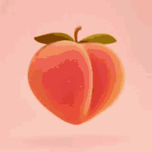 a peach with a green leaf is being touched by someone 's finger .