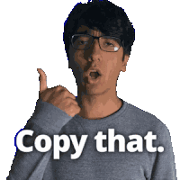 a man wearing glasses is giving a thumbs up and the words copy that are above him