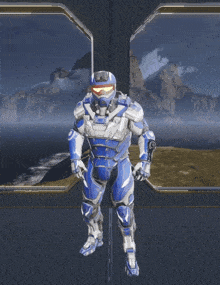 a man in a blue and white armor is standing in front of a window with his arms outstretched
