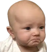 a baby making a funny face with his mouth open