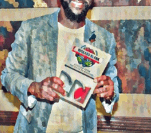 a man in a suit is holding a book titled rolling block