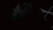 a black background with red lines and the words the watcherz