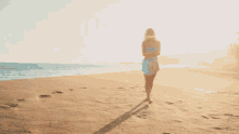 Walking On The Beach Alexi Blue GIF