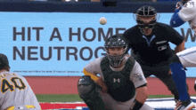 a baseball game is underway with a sign that says hit a home neutrog