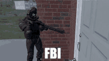 a man in a gas mask is holding a gun in front of a brick wall that says fbi on it
