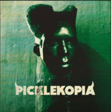 a poster for picklekopia shows a man with horns
