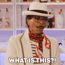 a man wearing a hat and scarf is asking what is this