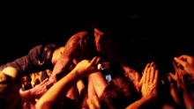 crowd surfing passe d over lift up rock concert crowd