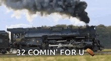 a train with the words 32 comin ' for u on the bottom