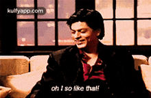 a man is sitting on a couch and says oh i so like that .