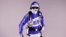 a man wearing a blue and white ultra shirt