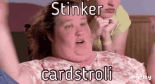 a woman in a wheelchair with the words " stinker cardstroli " on the bottom