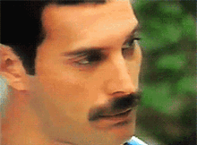 Freddie Mercury Thinking GIF - Freddie Mercury Thinking Serious GIFs