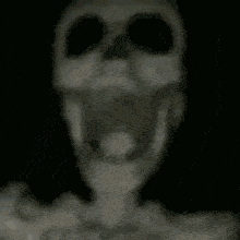 Skeleton Hanging On Fan GIF