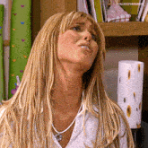 a close up of a woman 's face with the hashtag colucciyarango