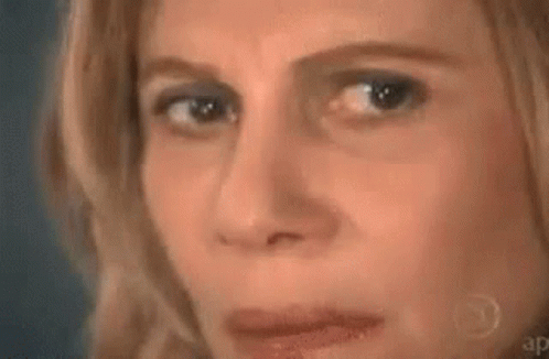 gif of &#39;confused lady looking around with math and equations flying around&#39; meme