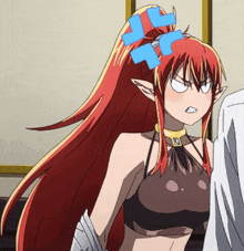 a girl with long red hair and a blue bow in her hair