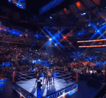 a wrestling ring with roman reigns written on the side