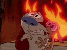 two cartoon characters are standing in front of a fireplace with flames behind them