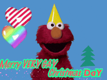 elmo says merry very gay christmas day with a candy cane heart in the background