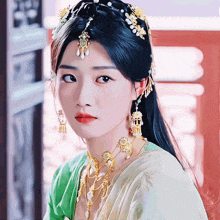 a close up of a woman wearing a green and white dress
