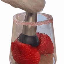 crushing strawberries meow chef that little puff juicing a strawberry pressing the strawberry
