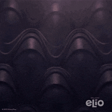 a disney pixar elio poster with a hand reaching out towards it