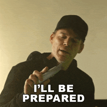 a man is holding a shaver and saying i 'll be prepared