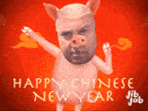 a pig with a man 's face on it says happy chinese new year jib jab