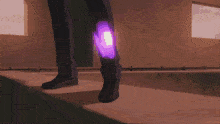 a person with purple lights on their pants is walking down stairs