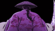 a man in a purple hat is holding a bloody sword