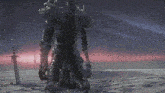 a skeleton with a sword kneeling down in the sand
